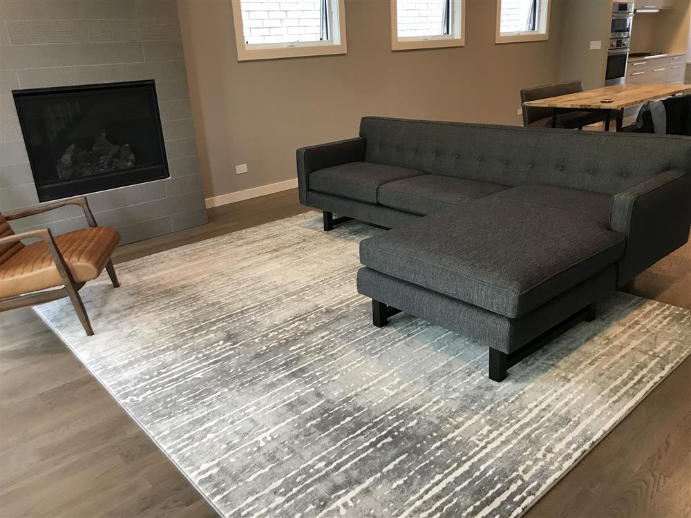 Rug Extending beyond the Chaise under a Sectional Sofa
